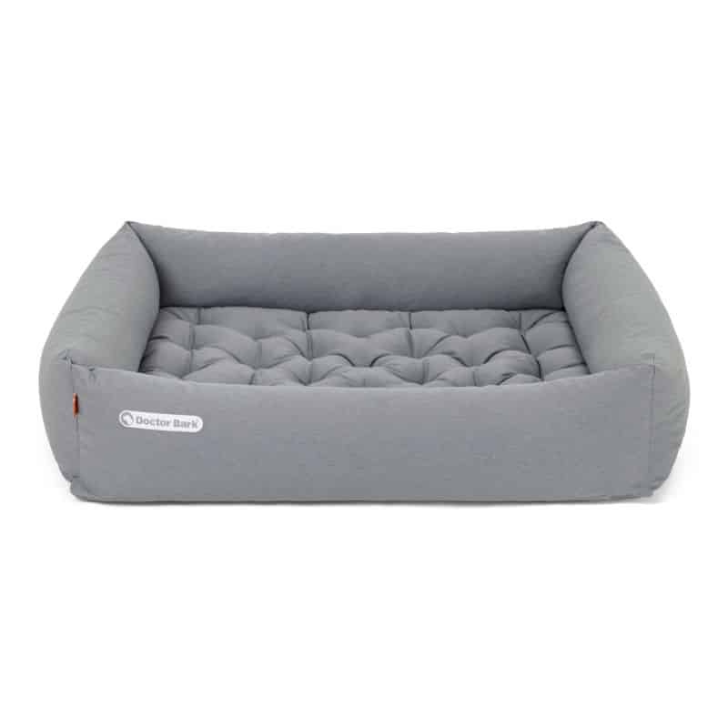 graues Hundebett mit umlaufendem Rand und abgesteppter Liegefläche